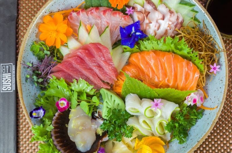 Platter Decorated with Different Flavors of Elegant Sushi Stock Photo