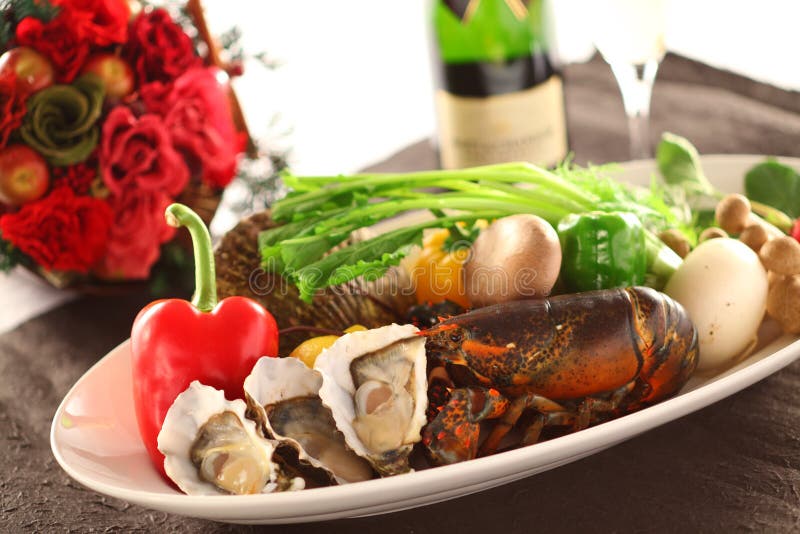 Platter of fresh seafood with oyster, lobster, clams, chili, mus stock images Platter of fresh seafood with oyster, lobster, clams, chili, mus stock images