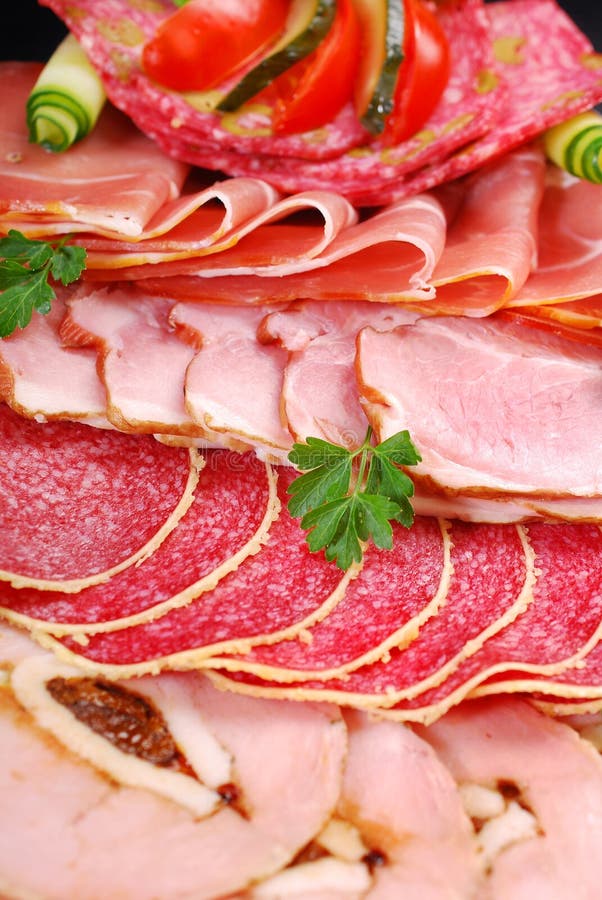 Platter of Cured Meat,ham and Salami on Eater Table Stock Photo Image