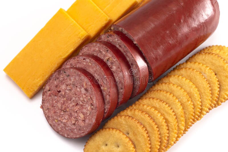 Platter of Summer Sausage Crackers and Cheddar Cheese on a White