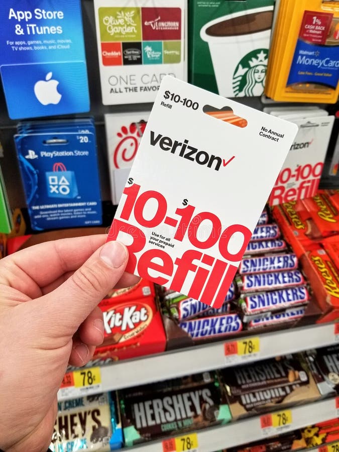 A Hand Holding a Verizon Gift Card. Editorial Stock Image - Image of