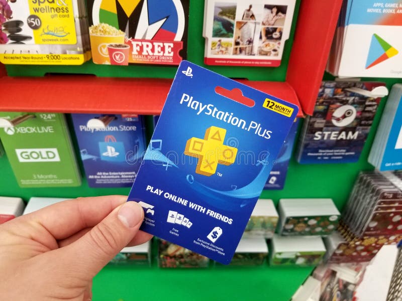 Play Station Gift Card In A Hand Editorial Image Image Of Illustrativeeditorial Holding 143552610 - how much is a roblox card at walmart