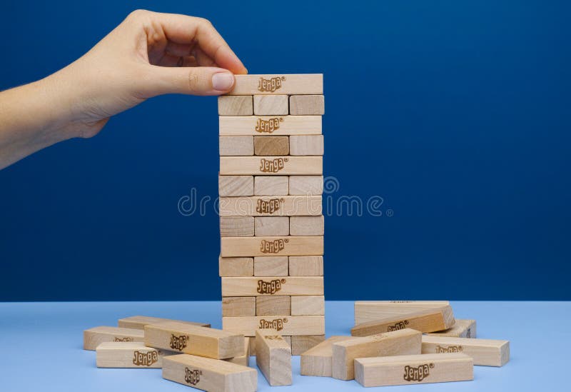 Heap of Jenga blocks editorial stock photo. Image of blue - 69354408