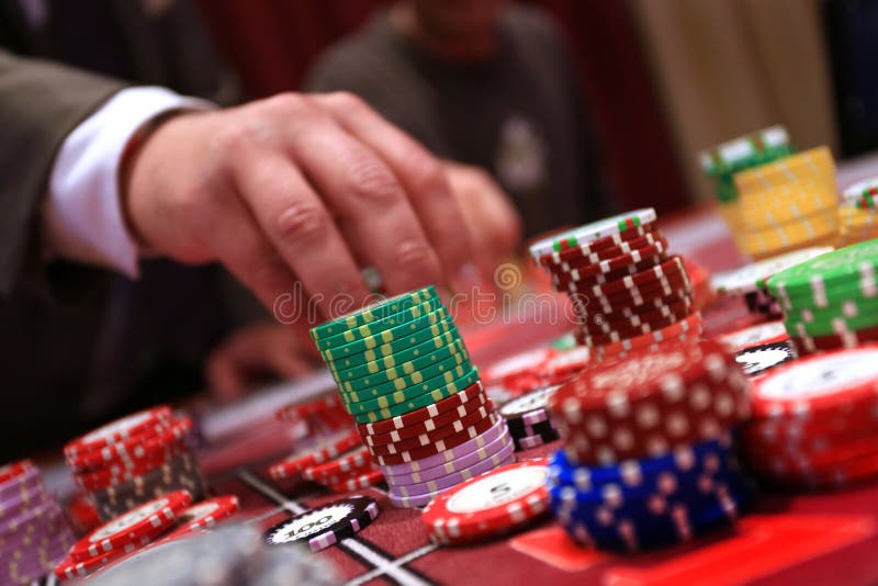 Player Placing Chips on a Gambling Table in Casino Stock Image Image