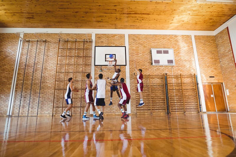 Player scoring a goal while playing basketball royalty free stock photos