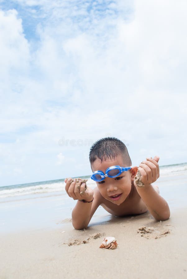 Playful boys enjoying the beach together, Stock Photo, Picture And Royalty  Free Image. Pic. BIM-BLD083548
