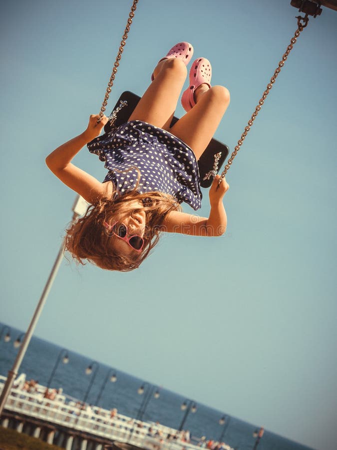 Playful Crazy Girl On Swing Stock Imag
