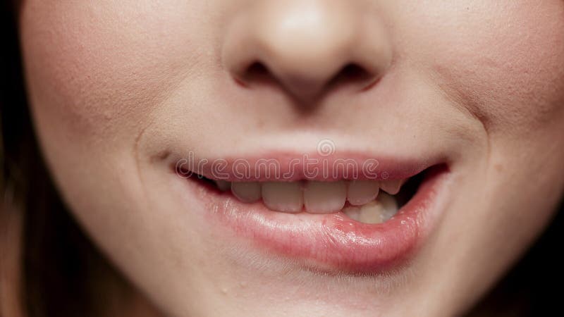 Close Up Image Of Male Biting His Lips Stock Photo, Picture and Royalty  Free Image. Image 17516228.