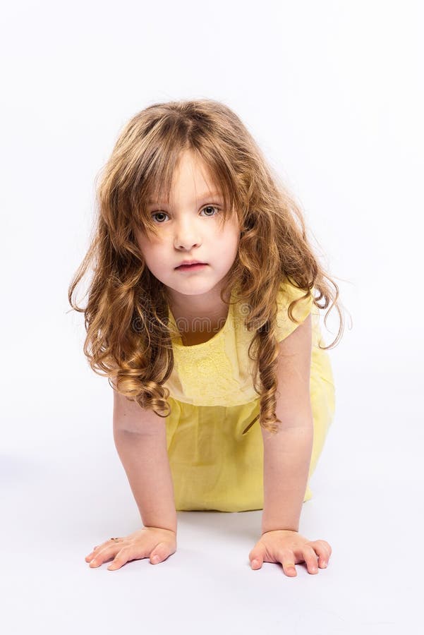 Portrait Of A Pretty 8 Year Old Girl In White Dress Stock Photo