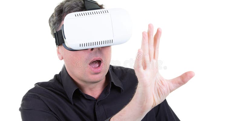 Playful man entertaining himself playing video games using virtual glasses isolated on white background royalty free stock photo