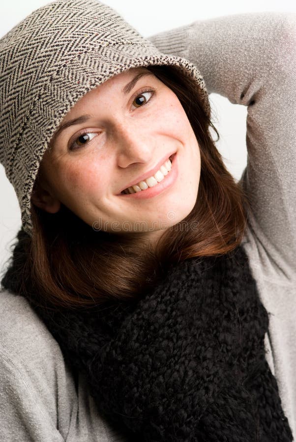 Playful woman, or teen in fall or winter clothing.