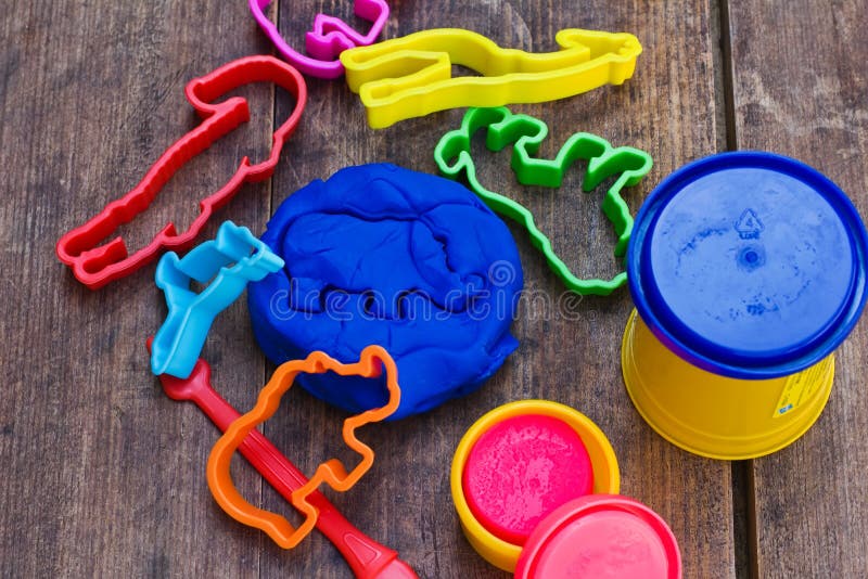 Playing with bright colourful clay dough