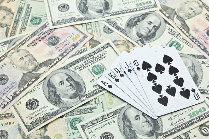 Playing Cards on Pile of US Dollar Banknotes Stock Image Image of