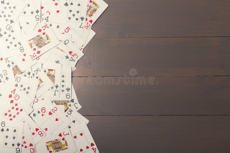 Playing Cards on Wooden Background with Copy Space Stock Photo - Image