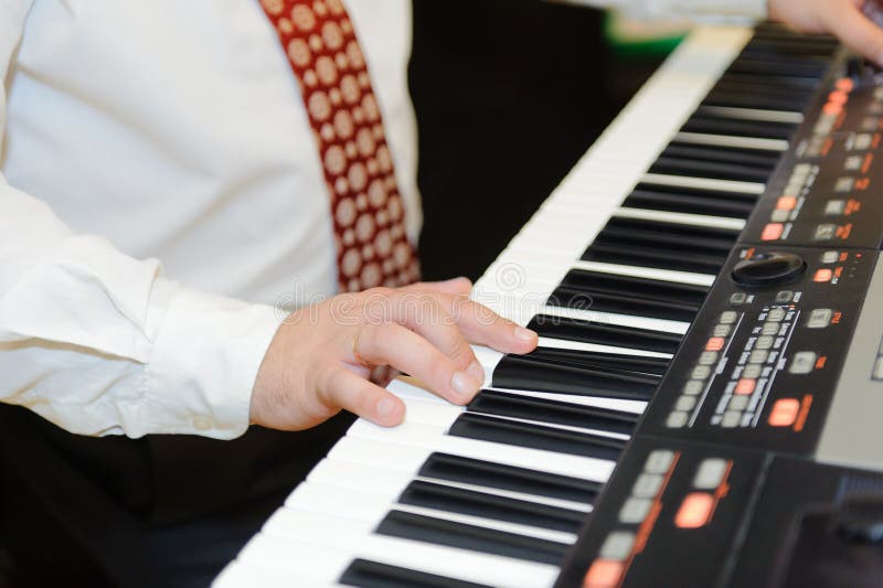 Playing Electronic Piano royalty free stock images