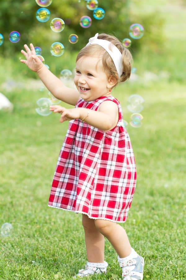 Playing in the garden baby girl