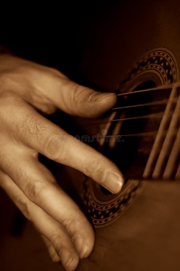Playing the guitar royalty free stock photography