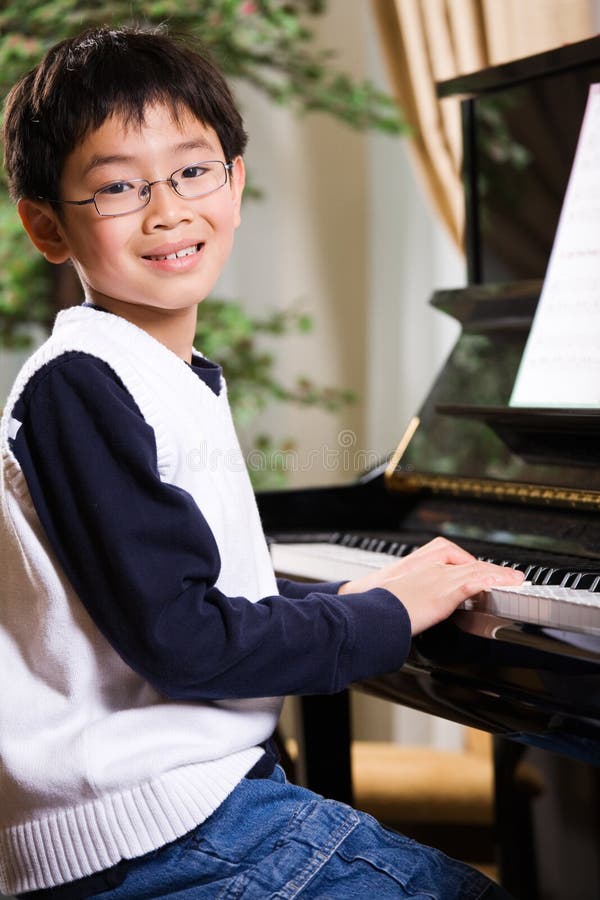 Playing piano stock photo. Image of music, person, indoor - 8759904