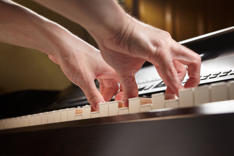 Jogo do piano foto de stock. Imagem de concerto, talento - 583958