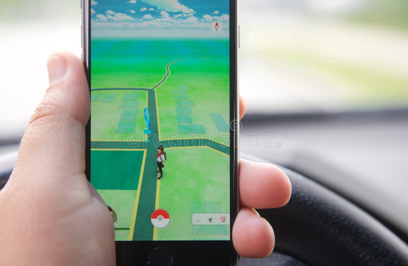 Playing Pokemon Go while Driving Editorial Photo Image of outside