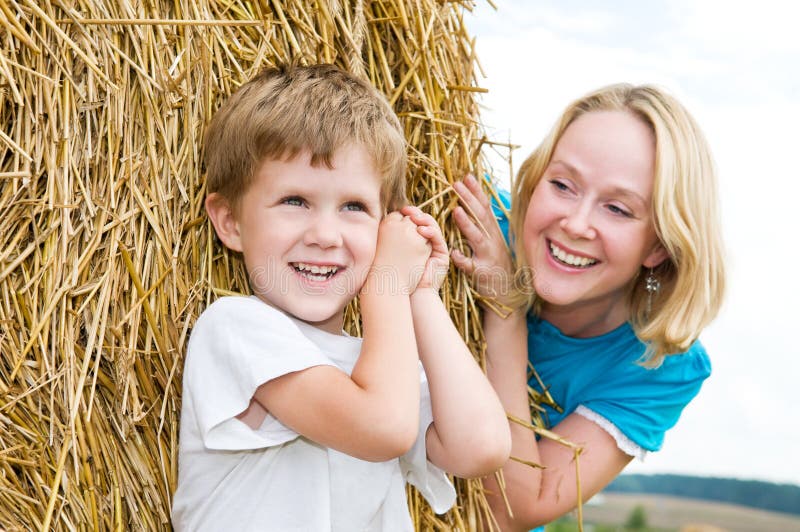 Playing smiley mother and son stock photography Playing smiley mother and son stock photography