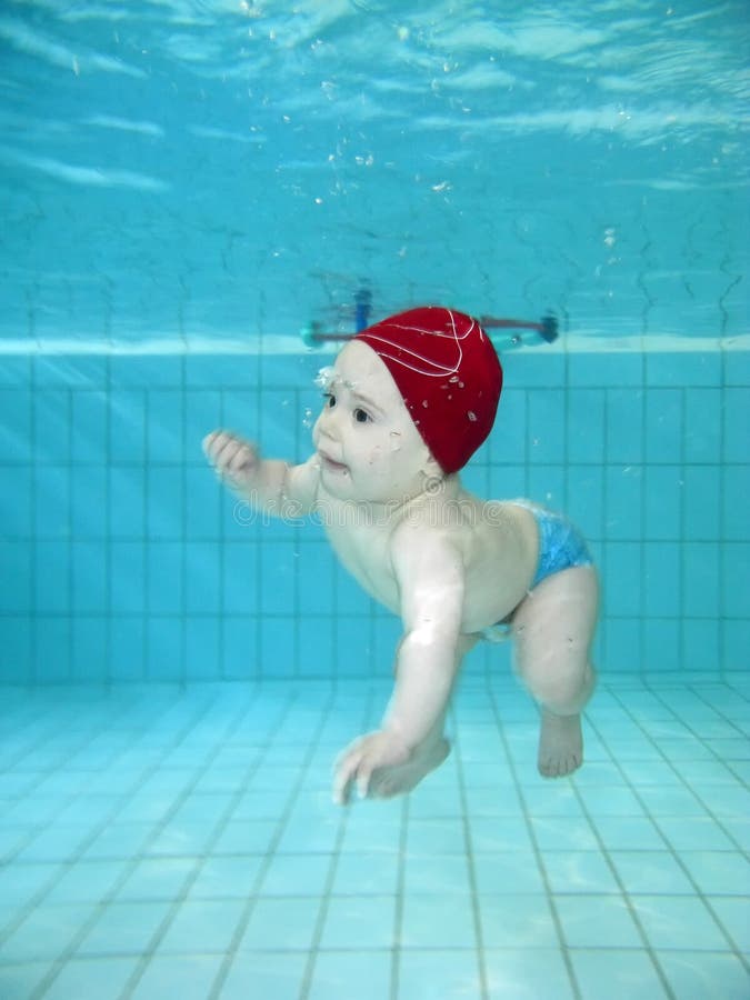 Playing in the swimmingpool royalty free stock image Playing in the swimmingpool royalty free stock image