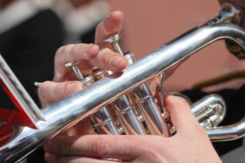 Close-up of military bandsman playing the trumpet