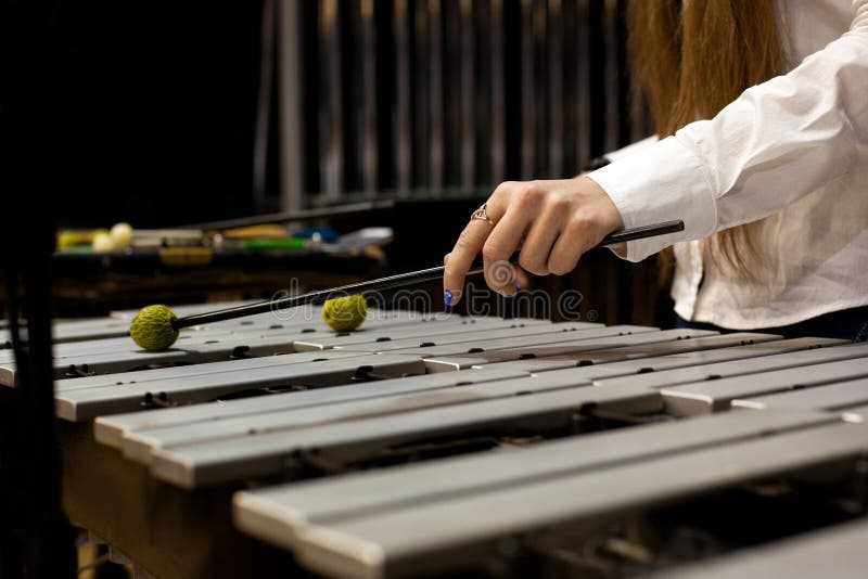 Hands girl playing the vibraphone. Hands girl playing the vibraphone