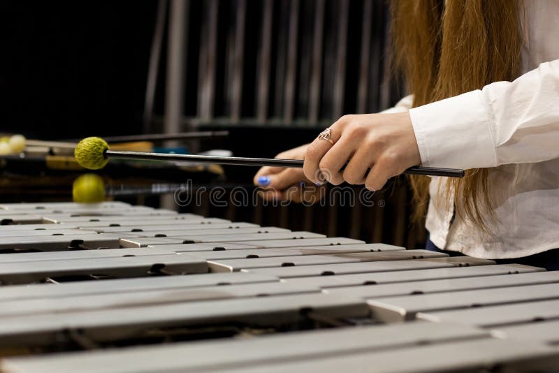 Hands girl playing the vibraphone. Hands girl playing the vibraphone