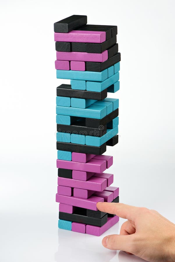 Playing wooden tower game stock image. Image of learn 131869245