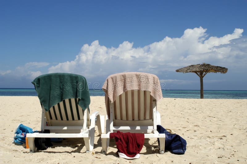 Two beach seats at a beach in Cuba. Two beach seats at a beach in Cuba