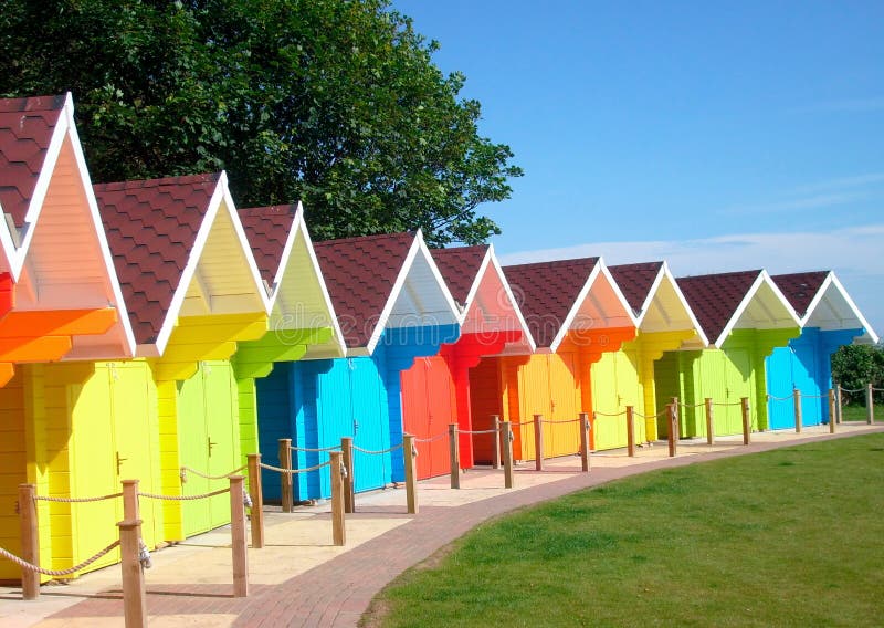 Exteriors of beautiful bright seaside beach chalets, Scarborough, England. Exteriors of beautiful bright seaside beach chalets, Scarborough, England.