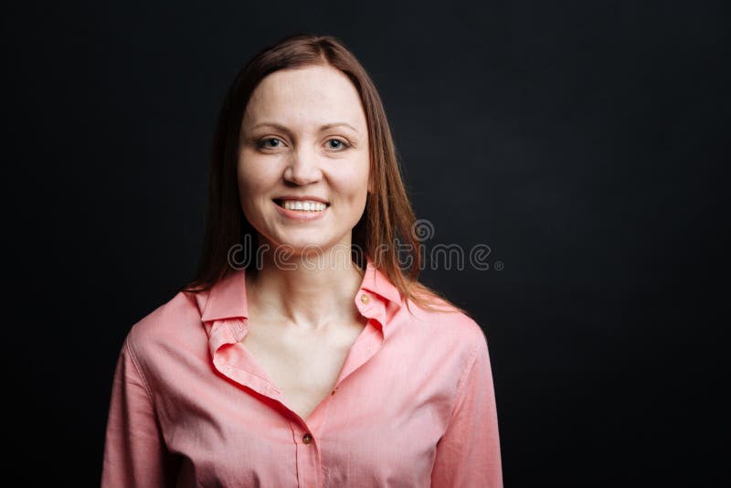 Pleasant Young Woman Expressing Joy Indoors Stock Photo - Image of ...