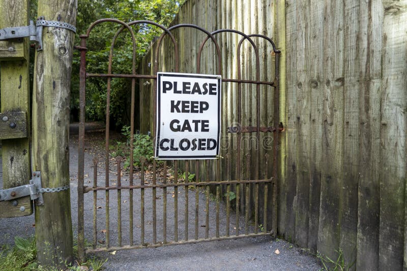 Please Keep Gates Closed Sign at Iron Gate in Ireland Stock Image