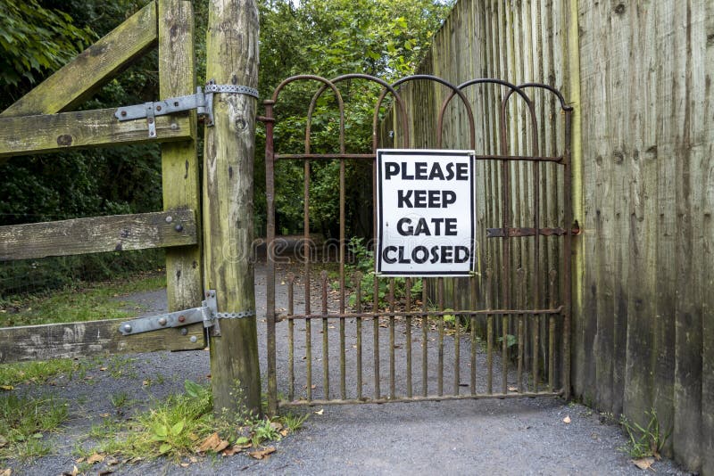 Please Keep Gates Closed Sign at Iron Gate in Ireland Stock Image