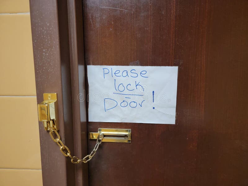 Please Lock Door Note on Bathroom Door with Chain Stock Photo Image