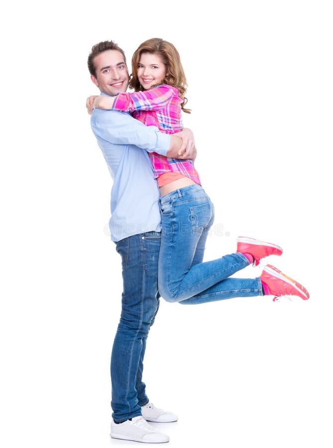 Plein portrait de jeunes couples heureux. photographie stock libre de droits Plein portrait de jeunes couples heureux. photographie stock libre de droits