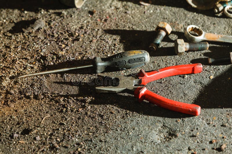 Pliers, Wrench Screwdriver on Floor. Stock Photo Image of mechanic
