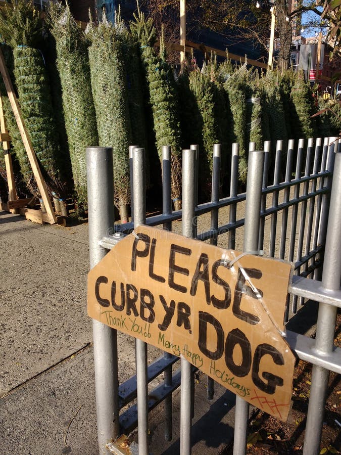 Plocka upp efter din hund, skära ner din hund, tacka dig! NYC NY, USA fotografering för bildbyråer Plocka upp efter din hund, skära ner din hund, tacka dig! NYC NY, USA fotografering för bildbyråer