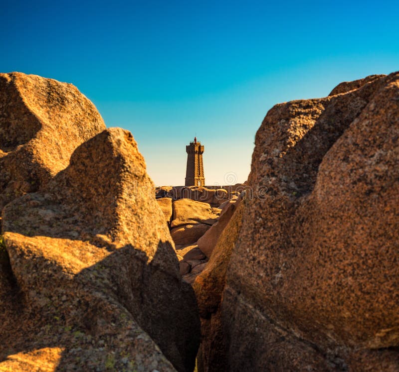 Ploumanac`h lighthouse between the rocks in pink granite coast