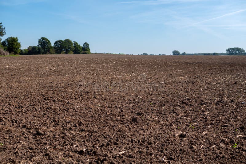 Plowed and harrowed field stock photo. Image of preparation 86019028