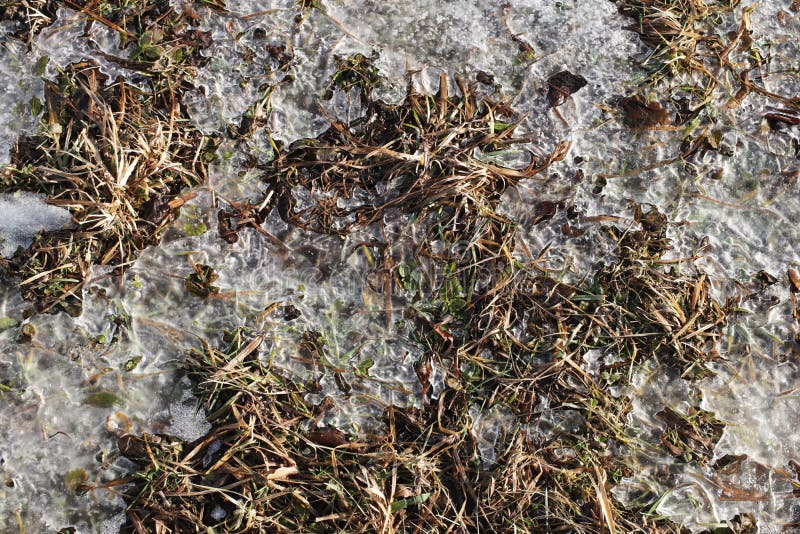 Plowed spring field. The beginning of the season of field work. Agro-industrial farm business. Snow melts on the ground. Warming royalty free stock photography Plowed spring field. The beginning of the season of field work. Agro-industrial farm business. Snow melts on the ground. Warming royalty free stock photography