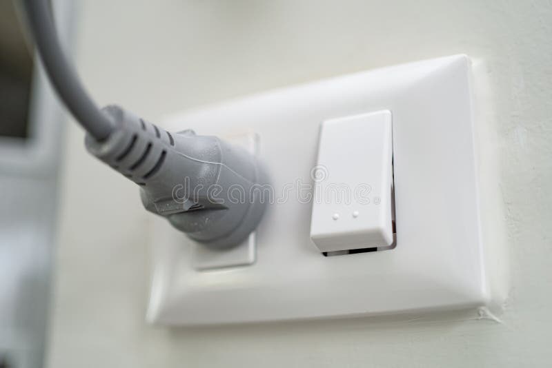 Plug Electric in the Socket on Wall at House Stock Image Image of