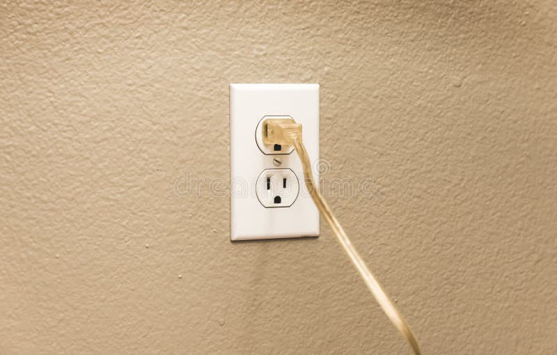 Plug in wall outlet stock photo. Image of energy, waste 82095294
