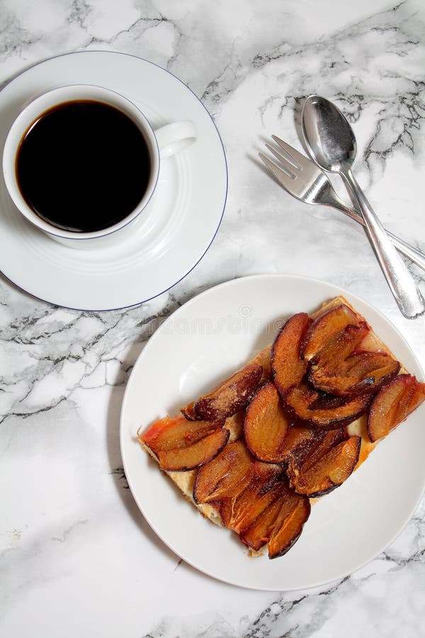 Plum cakes and coffee