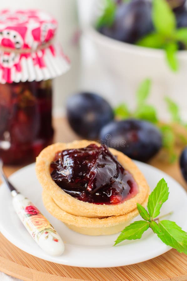 Plum, Orange and Mint Jam in Small Tart Shells (Tartlets) Stock Photo