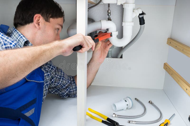 Plumber Fixing Sink in Bathroom Stock Image Image of plumber, janitor