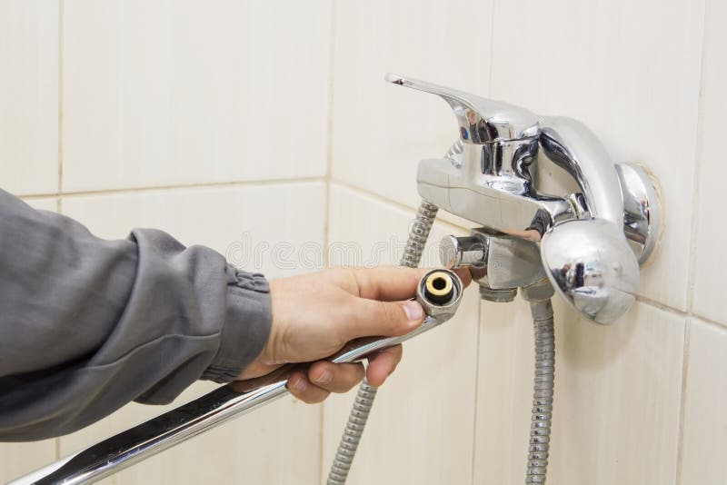 Plumber Hands Fixing Water Tap with Spanner Stock Photo Image of