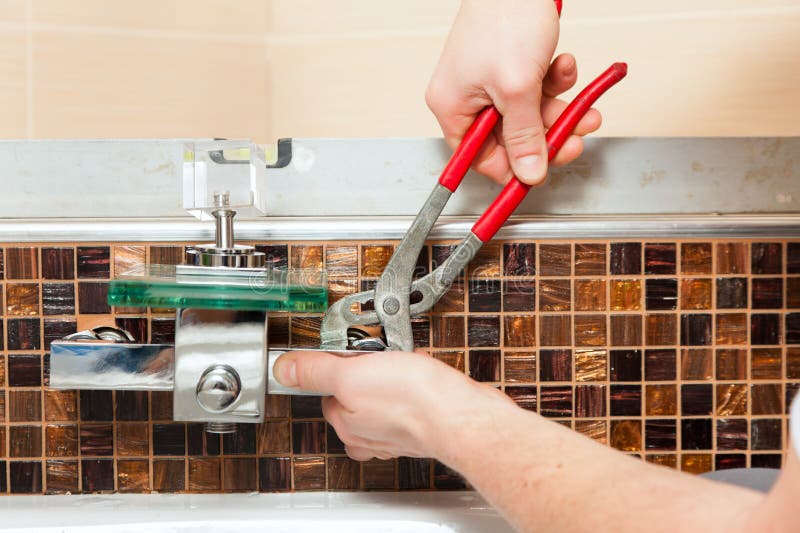 Plumber Installing a Mixer Tap in a Bathroom Stock Image Image of