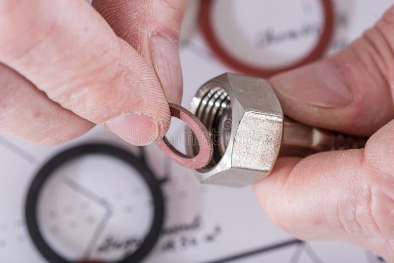 Plumber Putting A Gasket On A Plumbing Fitting Stock Photo Image of